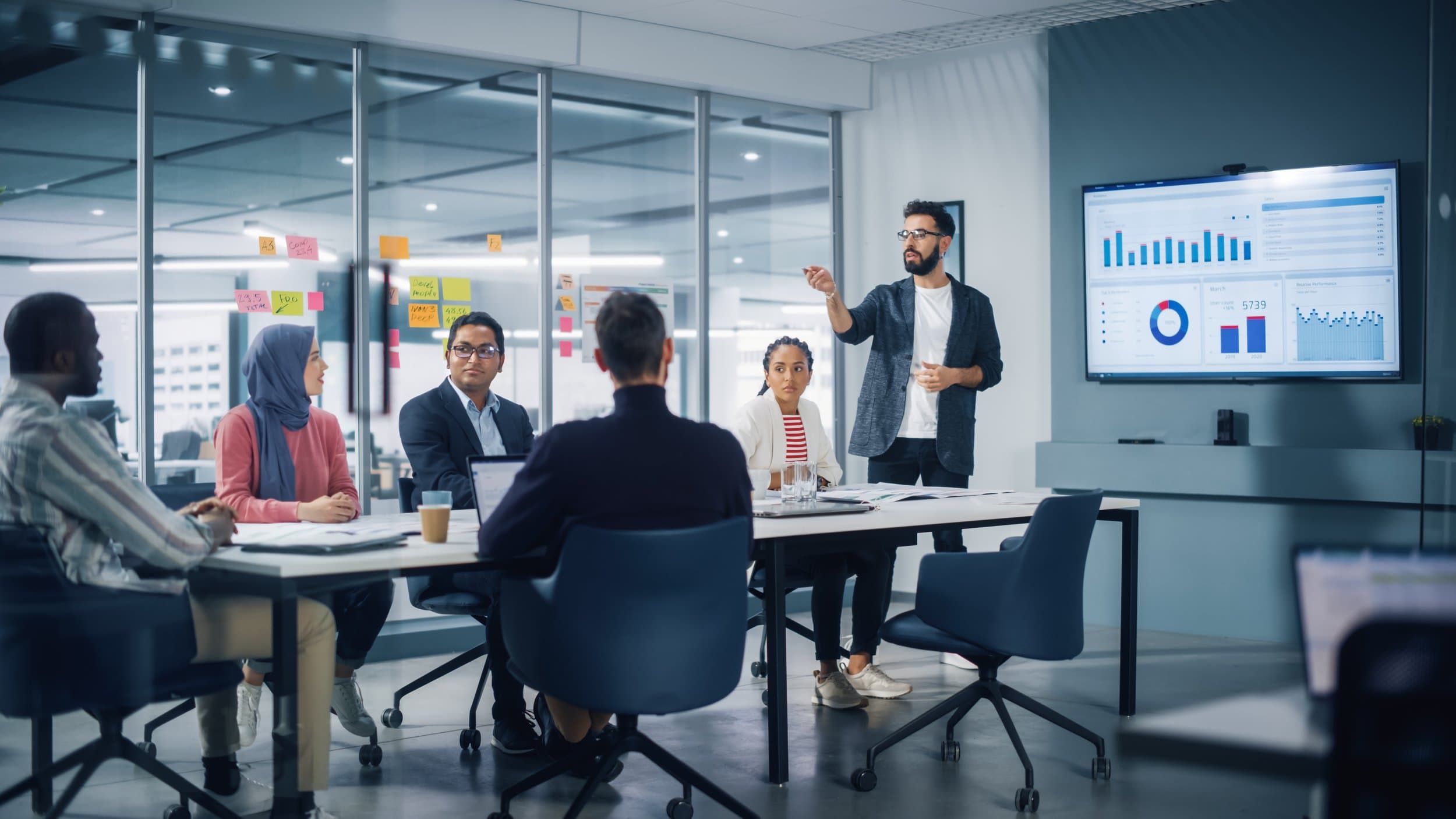 A team collaborating in a meeting room during a strategy session