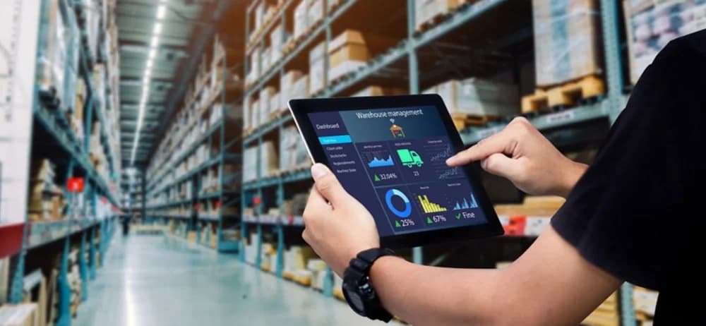 Warehouse team using MYOB Acumatica on a tablet